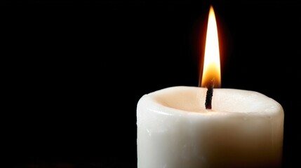 Burning Candle Flame on Black Background, Symbolizing Remembrance, Hope, and Celebration of Life