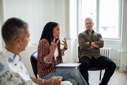 Group of people in a therapy session meeting