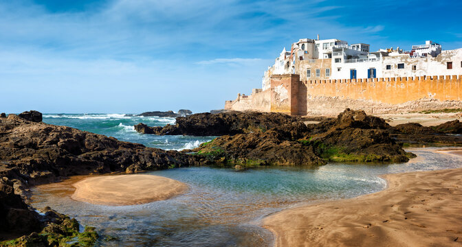 The sand beach at the walls of the historical Old town of Essaouira, Morocco