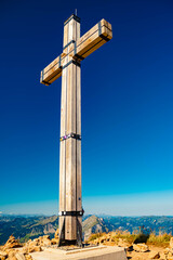 Alpine summer view with a summit cross at Mount Diedamskopf, Schoppernau, Bregenz, Vorarlberg, Austria
