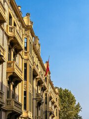 Pamplona street with historic buildings and modern balconies