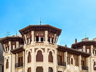 Sunlit urban scene in Pamplona with mixed architecture