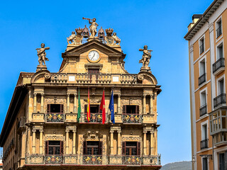 Pamplona street with historic buildings and modern balconies
