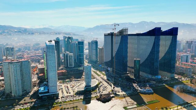 Batumi city with skyscrapers in downtown and city park, Georgia. Aerial panorama shot
