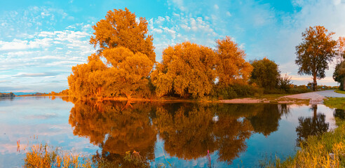 Beautiful summer evening view with reflections at Stephansposching, Danube, Deggendorf, Bavaria, Germany