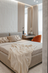 Bedroom with a bed, bedside table and lamps