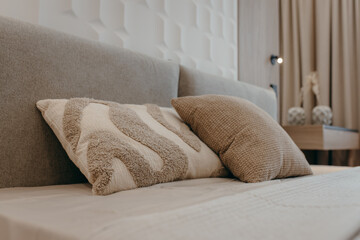 Bedroom with a bed, bedside table and lamps