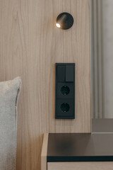 Bedroom with a bed, bedside table and lamps