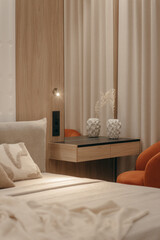 Bedroom with a bed, bedside table and lamps