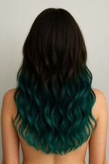 Fototapeta premium Dark brown to emerald green dip dye hair