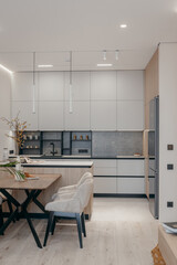 Interior of modern kitchen studio in house