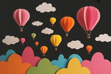 Acrylglasbilder Heißluftballon Colorful hot air balloons and paper clouds floating against a dark background with a landscape of colorful paper cutouts at the bottom  © photoshop #11320770