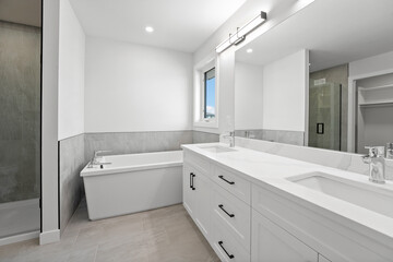 Bathroom with a white bathtub and sink