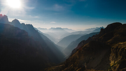 Aerial view of winding mountain road in the Dolomites, Italy