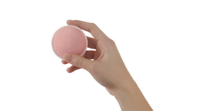 hand holding pink makeup sponge for beauty application . Isolated on transparent background, png