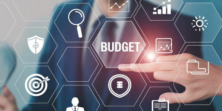Financial Strategies at Fingertips: A businessperson's hand points toward a Budget icon within a network of financial symbols, representing the interconnectedness of fiscal planning and strategies.