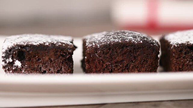 Homemade chocolate brownies on wooden table