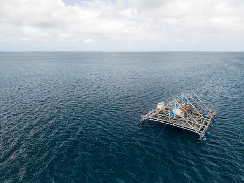 Fishing homes in the ocean near Ngurbloat Beach in Kei Kecil, Southeast Maluku, Indonesia
