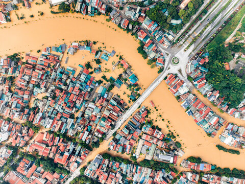 Aerial view of a flooded town with submerged roads and inundated buildings. Cao Bang city, Cao Bang, Vietnam