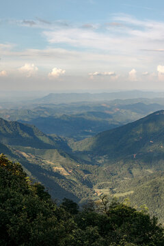 Expansive mountain landscape with layered hills under a partly cloudy sky. Loc B&Iuml;nh District, Lang Son, Vietnam