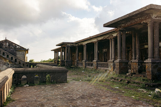 Abandoned ancient stone building with columns and cloudy sky in the background. Loc B&Iuml;nh District, Lang Son, Vietnam