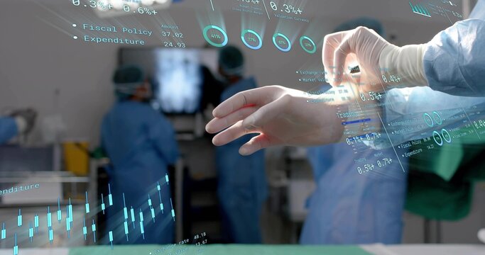 Manipulating gloved hand using holographic financial charts in operating theatre, copy space