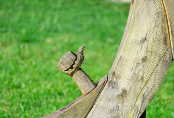 A gesture of a raised thumb