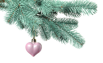 Christmas tree branch with decorative heart isolated on white