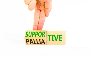 Palliative or supportive therapy symbol. Concept words Palliative to Supportive on beautiful wooden cubes. Beautiful white background. Medical, palliative or supportive therapy concept. Copy space.