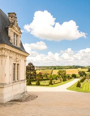 Palace gardens under a summer sky