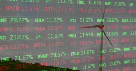 Percentages updating every second driving wind turbine blades rotating against dusk showing trend - Powered by Adobe