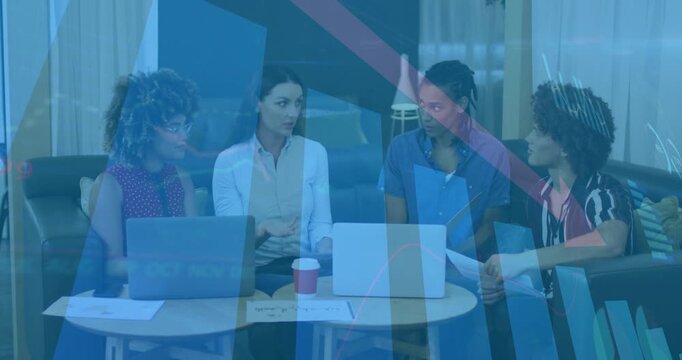 Businesswoman leaning forward and gesturing to laptop chart, driving joint data review among team