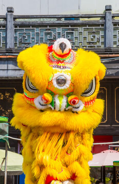 Yellow chinese lion in the ancestral temple comples of Foshan, China