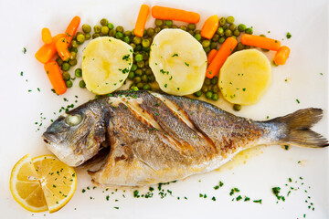 grilled fish with vegetables, sea ​​bass