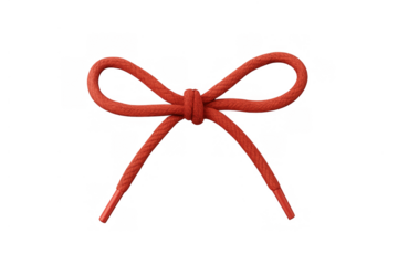 Red shoelace tied in a decorative bow knot, isolated on transparent background, perfect for fashion accessories and gifts