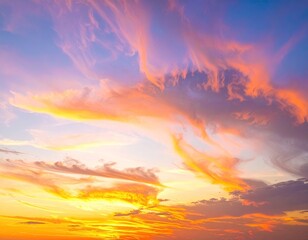 Vibrant sunset sky with feathery clouds, gradient colors