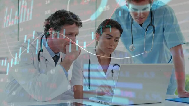 Senior doctor pointing screen, physician typing data, clinician highlighting chart for consensus