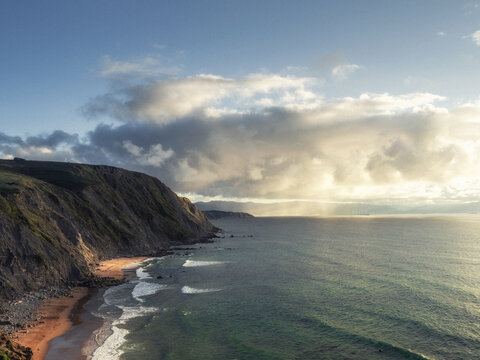 Coastal landscape at sunset after a summer storm