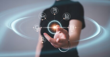 Digital Touch: A person, at the heart of digital interaction, points towards glowing icons that represent a technological interface, embodying the dynamic nature of innovation.