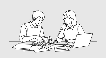 Two young people are studying together at a table with books and a laptop, engaging in a discussion