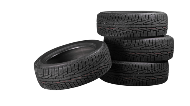 transparent png,Stack of four black car tires isolated on transparent background, PNG, new rubber wheels for automobile, transportation, and automotive maintenance concept