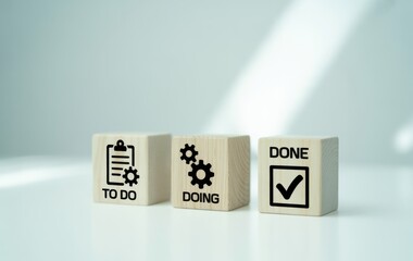 Task Completion Blocks: Three wooden blocks, symbolizing the stages of a project from To Do to Done, conveying process and accomplishment