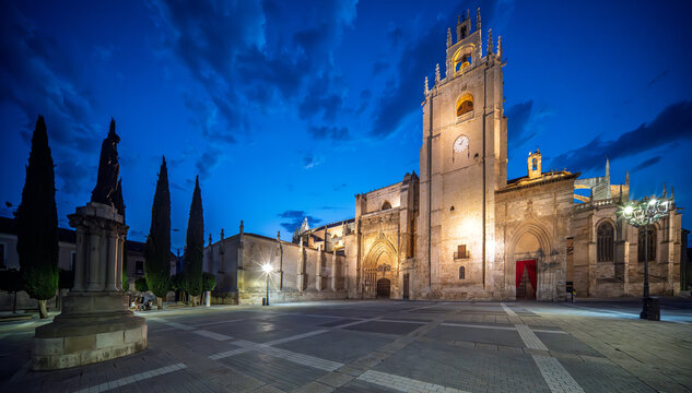 Illuminated Gothic Palencia Cathedral at dusk in Spain - Powered by Adobe