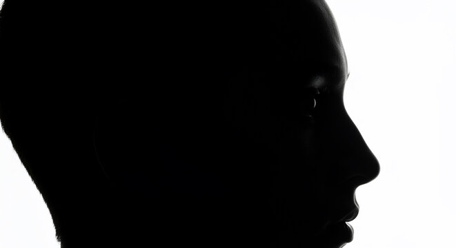 Black silhouette profile of human head