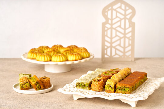 Assorted baklava and semolina maamoul or mamoul cookies. Traditional arabic Eid al Adha, Eid al Fitr , Ramadan sweets