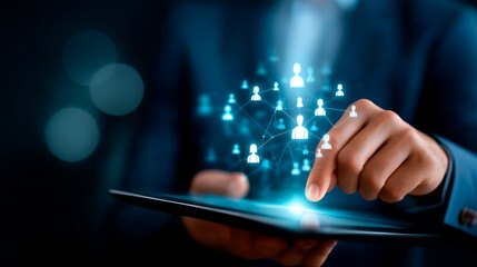 Faceless businessman using stylus on tablet with digital HR management interface display employee structure organizational chart team analytics dashboard workforce planning