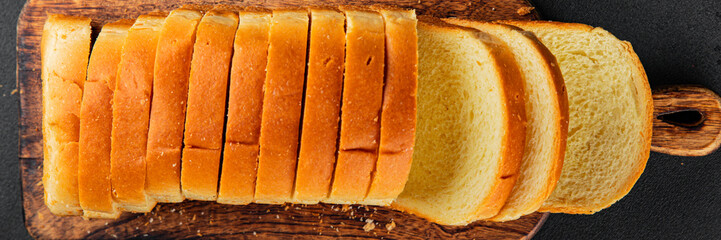 Brioche bread slices bakery pastry natural product tasty snack fresh delicious gourmet food background on the table rustic top view copy space