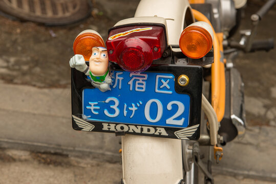 Seoul, Gyeonggi, South Korea. March 31, 2015: Motorcycle with Buzz Lightyear toy attached to license plate in Seoul, South Korea.