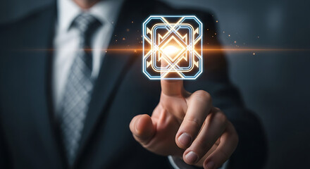 Businessman touching a glowing futuristic icon with his finger in a dark corporate setting