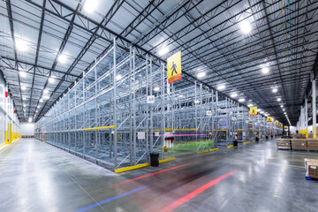 Interior of modern warehouse with empty racking system design for cold storage	